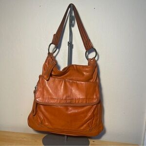 49 Square Miles Orange Leather Hobo Bag.
